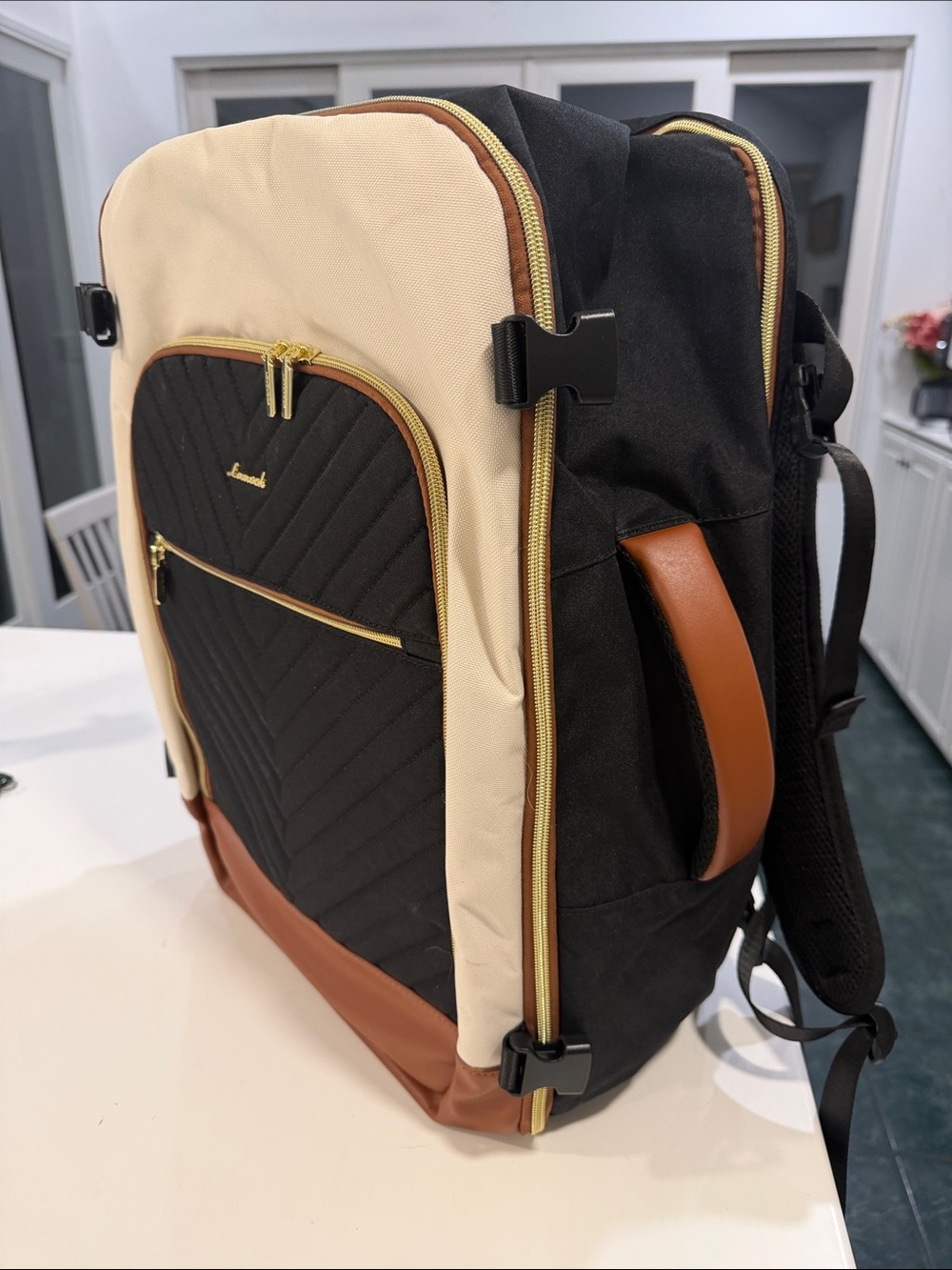 Black and Tan Quilted Travel Backpack Carry On